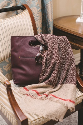 Universal Thread Burgundy Cut Out Tote Handbag, $35, Target. Houndstooth Blanket Scarf; Designer’s Own. New Day Women’s Aviator Sunglasses, $17, Target.