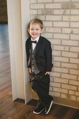 Gino Giovanni Tuxedo, $30; Just For You Formalwear Consignment. Stride Rite Riley Black Shoes, $56; Morgan’s Shoes. 