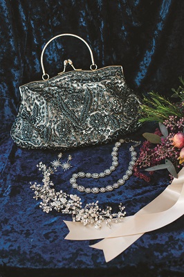 Charcoal Beaded Bag, $59, Crystal Starburst Earrings, $239, Elizabeth Crystal Necklace, $399; Vera's House of Bridals.