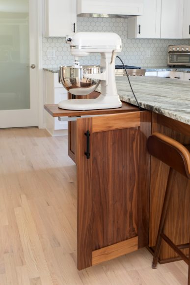 A pop-up mixer stand saves Shannon’s back from heavy lifting, while 90-degree drawers in the kitchen corner replace a lazy Susan. “You lose a little space, but you get a much more useful space,” Shannon says. “With a lazy Susan, you’re always losing something back there.”