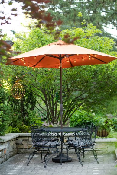 The patio is surrounded by a Japanese maple, woody plants, hostas (which symbolize friendship and devotion) and a burning bush Rybowiak saved from the original garden.