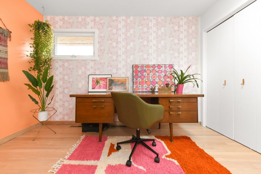 Drammeh loves her home office, a cheery space featuring Marimekko cocoa pod wallpaper and a vintage Moroccan rug she scored on Etsy. But her favorite accent is the pink-and-orange batik, created by Appleton artist MJ Scandin.
