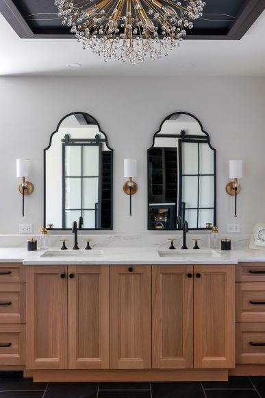 The streamlined double vanity further opens up the bathroom and eliminates the last of the 45-degree angles that previously dominated the space. 