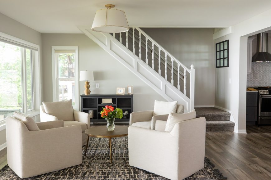 The home’s new lounge area features four swivel chairs so it’s easy to chat with family and friends, or turn around to take in the gorgeous lake views. “This is a whole new space in our home that is used constantly,” Katie says.