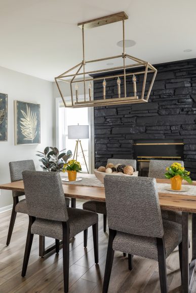 While the fireplace dominates the dining room, all of the space’s elements pair together beautifully, including the paintings, which came from The Montage in McFarland. “They might be my favorite paintings in the entire house,” Katie says.