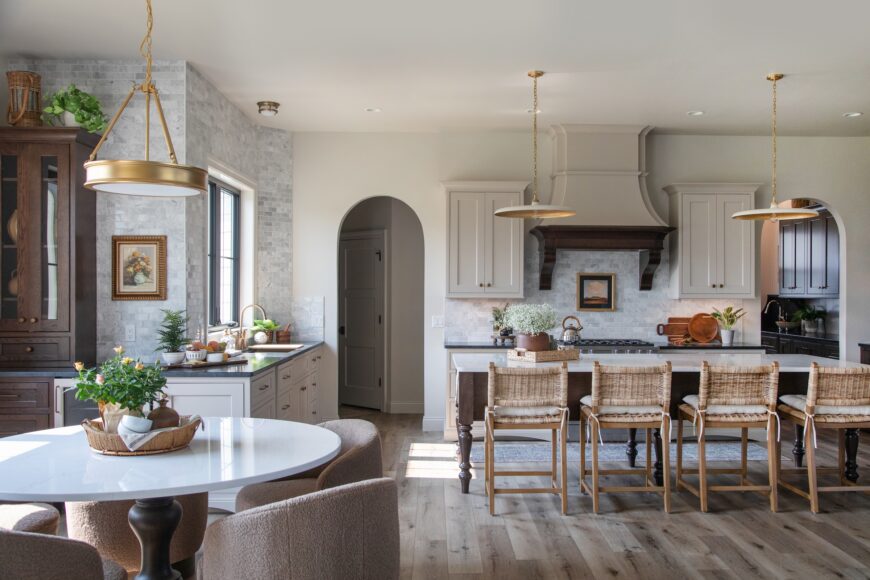 Tonia Crary worked with Madison Lighting to select all of the stunning lights throughout the home. She sourced the flooring, cabinetry and tile from Coyle Carpet One Floor & Home. The countertops were from Wisconsin Granite.