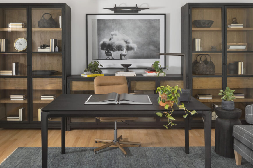 “My partner works from home, so the office needed to be functional for video calls and remote work,” says the homeowner. “It was also really important that it be a peaceful place that supports a positive work environment.” Franklin sourced playful art and modular pieces to create cubbies with a built-in effect.