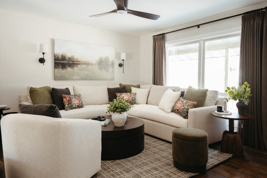 The homeowners selected a cream-colored sectional and chair, which Schaaf notes are covered in performance fabrics, for the living room. “They have two young children and they were confidently able to have that light-colored furniture because of the fabric choices that we made. It’s a durable fabric for those kids!”