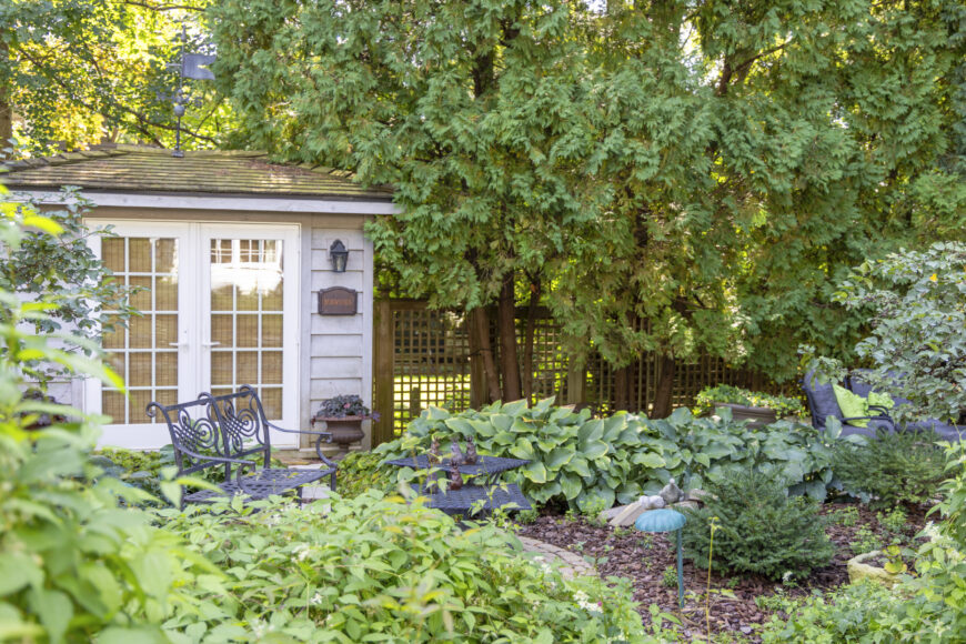 Blettner’s quaint garden shed pulls double duty, providing storage while enhancing the backyard’s charm.